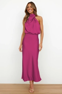 Detail of fuchsia satin sleeveless dress featuring elegant halter scarf neck design