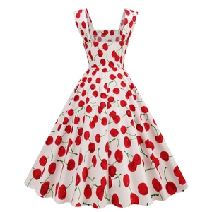 Close-up of 50s vintage midi dress with red cherry print and square neckline