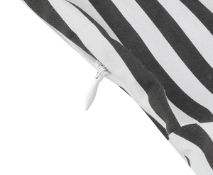 Detail of white invisible zipper on black and white striped cotton canvas fabric