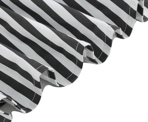 Detailed close-up of black and white striped fabric with premium hemmed stitching detail