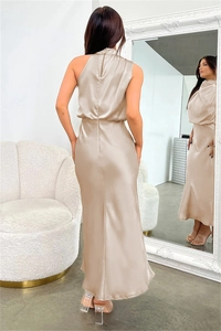 Detail of champagne satin sleeveless evening dress showing smooth texture and back zipper