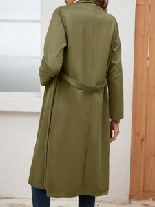 Rear view of olive green faux suede trench coat with adjustable waist belt details