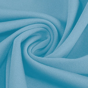 Gros plan détaillé du tissu en dentelle bleu ciel montrant la texture fine et le tissage