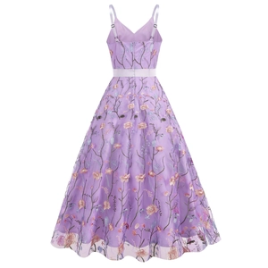 Detailed close-up of colorful floral embroidery on purple mesh V-neck evening gown