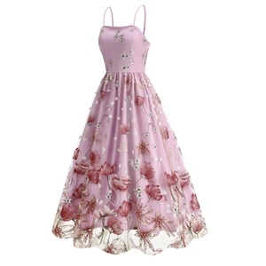 Detail of floral embroidery on lavender mesh cocktail dress with elegant flared skirt