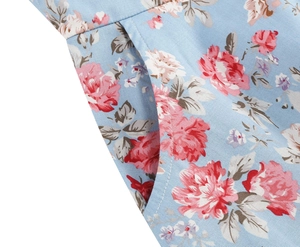 Close-up of vintage floral print fabric and reinforced pocket stitching detail