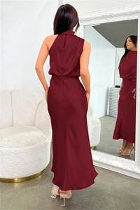 Detail of burgundy satin sleeveless dress with high neck halter and back zipper