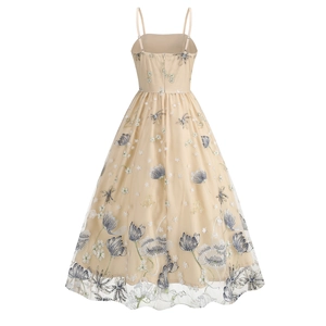 Detailed back view of vintage mesh dress featuring tulip embroidery and invisible zipper