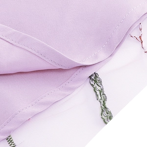 Detailed embroidery on lavender fabric with layered white tulle mesh for girls' dress