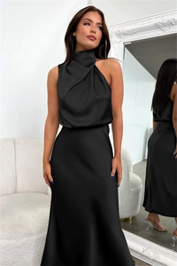 Detail of the elegant black satin sleeveless dress with a pleated high neck and drape