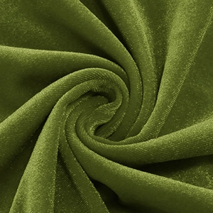 Dettaglio macro del tessuto in velluto verde oliva con eleganti riflessi di luce