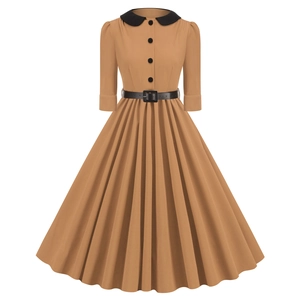 Detail of vintage brown dress with black Peter Pan collar and buttoned bodice detail