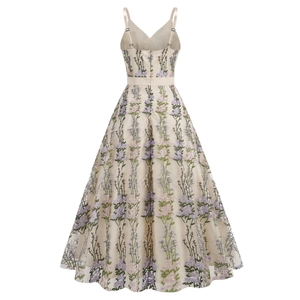 Detailed back view of a V-neck embroidered mesh dress with floral patterns and a zipper
