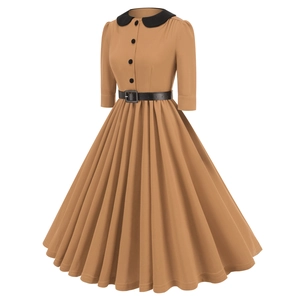 Detail view of vintage camel dress with black Peter Pan collar and matching waist belt