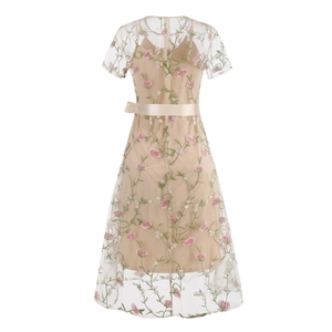 Detail view of the floral embroidery and satin waist tie on this two-piece mesh dress
