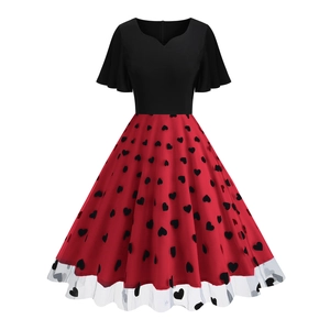 Detail of vintage heart neck dress with red heart print skirt and mesh embroidery trim