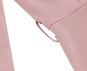 Close-up of pink dress fabric texture showing detailed weave and matching belt loop