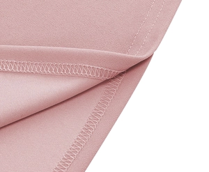 Detailed close-up showing precise pink fabric inner stitching and smooth hem finishing