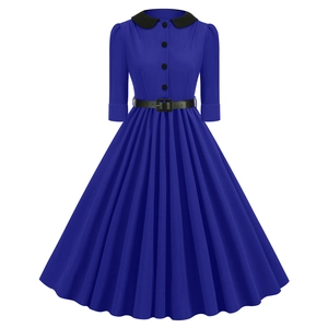 Close-up of vintage blue dress showing Peter Pan collar and pleated skirt details