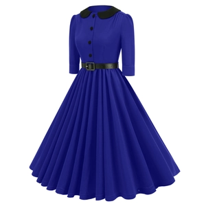 Detailed view of royal blue vintage dress with black Peter Pan collar and waist belt