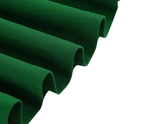 Detail of dark green dress fabric showing pleated design and fine double-stitched hem finish