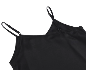 Close-up of black satin camisole featuring V-neckline and adjustable silver buckle straps