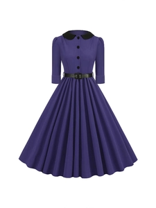 Retro purple Peter Pan collar dress with 1950s Audrey Hepburn style flare and black belt