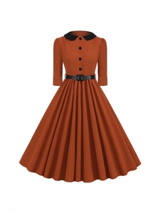 Retro orange midi dress with Peter Pan collar and black belt for elegant autumn wear