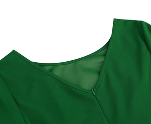 Detail of dark green dress neckline with V-back design, mesh lining and invisible zipper