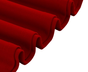 Detail view of red summer dress fabric with elegant wavy pleats and durable double stitching