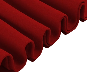 Detailed macro view showing the thick wine red velvet fabric texture and wave pleats