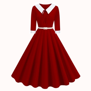 Detail of red vintage A-line dress featuring white lapel collar and mid-length sleeves