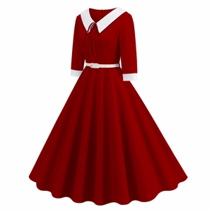 Detail of vintage red dress featuring white Peter Pan collar and contrast cuffs