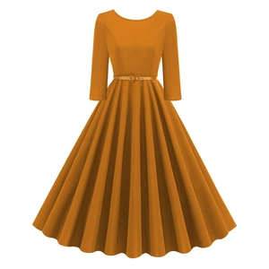 Detail view of vintage dark orange A-line dress with 3/4 sleeves and pleated skirt hem