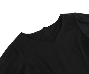 Detail of elegant V-neckline with pleated flutter sleeves and back invisible zipper