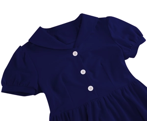 Detail of navy dress with white Peter Pan collar, vintage buttons and puff sleeves