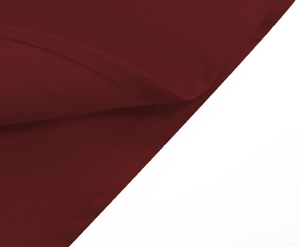 Macro view of refined stitching and wine red knitted fabric texture for a vintage dress