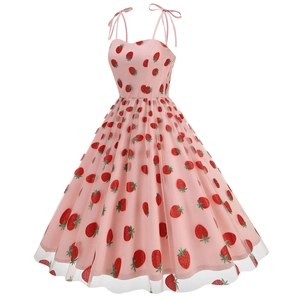 Close-up of pink mesh dress featuring red strawberry embroidery and sweetheart neckline