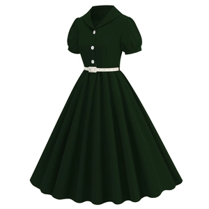 Detail of dark green vintage dress featuring shirt collar, white buttons, and puff sleeves