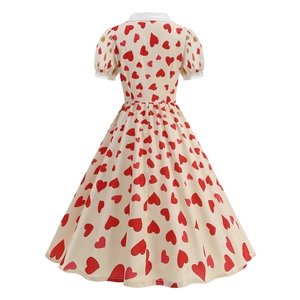 Detail of red heart prints on cream A-line dress with white lapel and waist design