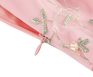 Close-up of pink mesh dress featuring floral embroidery and high-quality invisible zipper
