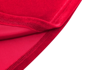 Detailed close-up of the red velvet fabric with high-quality stitching and smooth seams