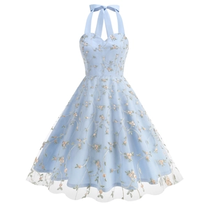 Close-up of pink floral embroidery on a light blue mesh sleeveless party dress