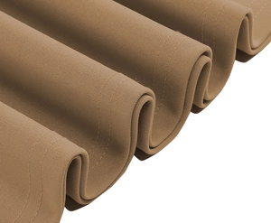 Detail of elegant dress hem with wavy edges and professional double stitching craftsmanship