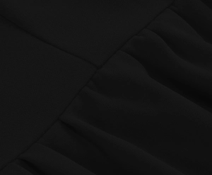 Detailed macro view of black chiffon fabric showing clean seams and pleated gathering textures