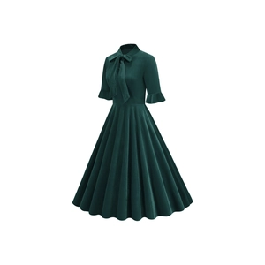 Detail of dark green velvet vintage dress featuring a bow neckline and pleated A-line hem