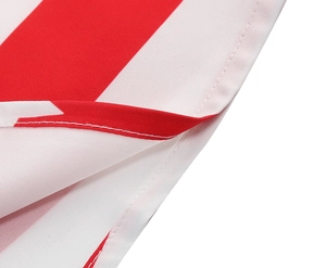 Close-up of red and white striped fabric with precise white stitching details