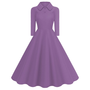Detail view of the Peter Pan collar and button accents on the vintage purple A-line dress