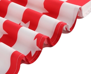 Detail of red and white geometric pattern fabric with high-quality stitching and texture