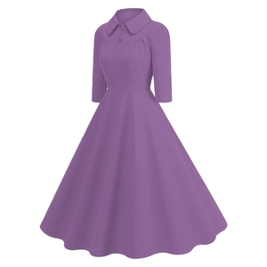 Detail view of purple vintage A-line dress with Peter Pan collar and elegant button accents